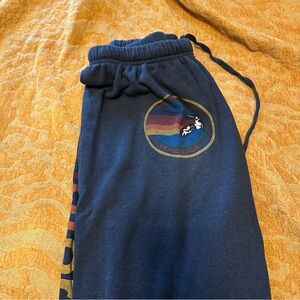 Aviator Nation Blue Track Pants with Rainbow Design